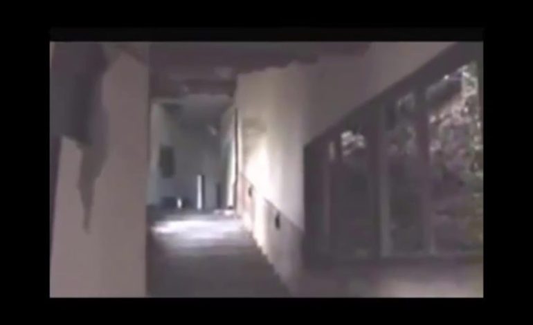  Abandoned Building Captures Ghostly Apparition Walking Down Stairs