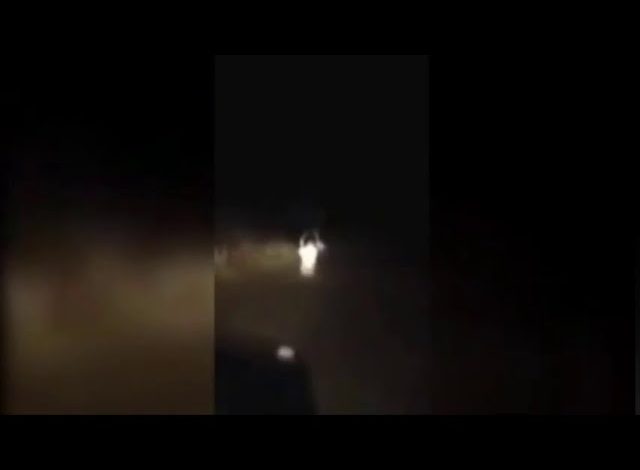  Mysterious White Figure Haunts Group of People Driving Down Abandoned Road
